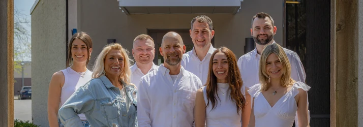 Chiropractor Edina MN Mackenzie Arellanes David Leske Danny Heim and James Anderson with Team About Us Drs. Mackenzie Arellanes, David Leske, Danny Heim, and James Anderson are pictured with their team